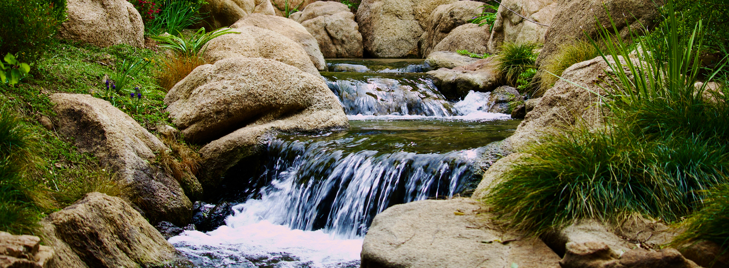 Small waterfall flowing over rocks
